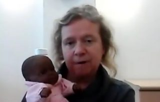 Peggy with a baby doll
